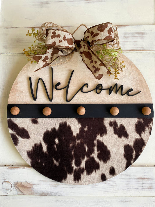 Cow Print Welcome Door Hanger